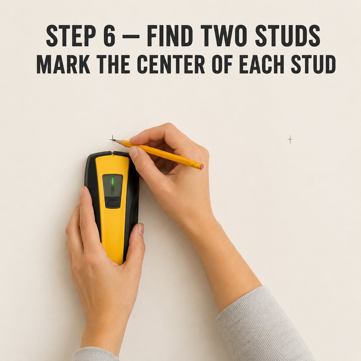 Using a stud finder to mark two studs for a backpack rack