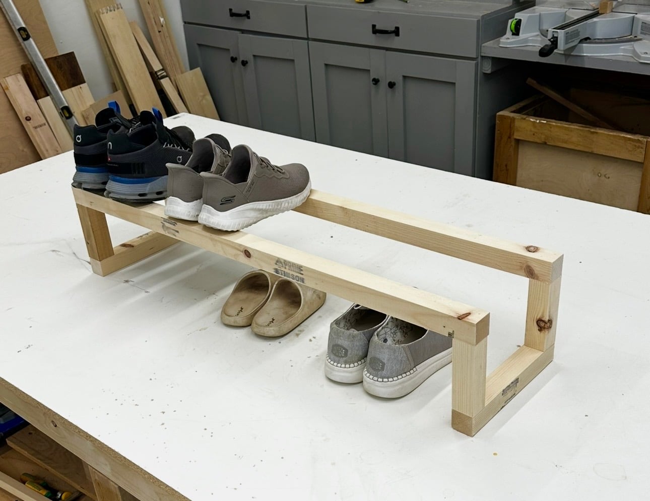 One-board DIY shoe rack providing two rows of shoe storage